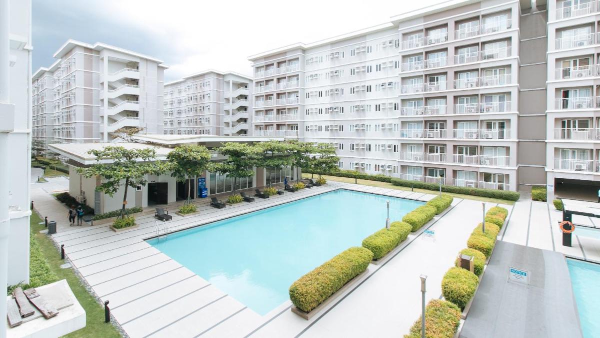 Jamah's Staycation at SMDC Trees Residences by RedDoorz - Housity