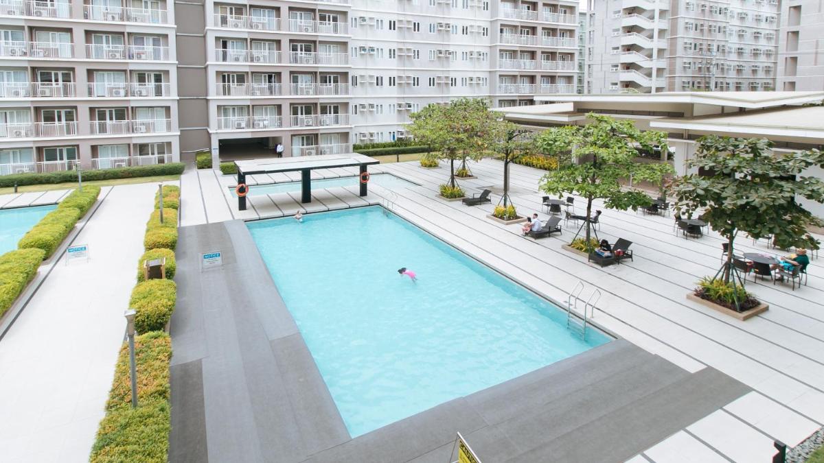 Jamah's Staycation at SMDC Trees Residences by RedDoorz - Housity