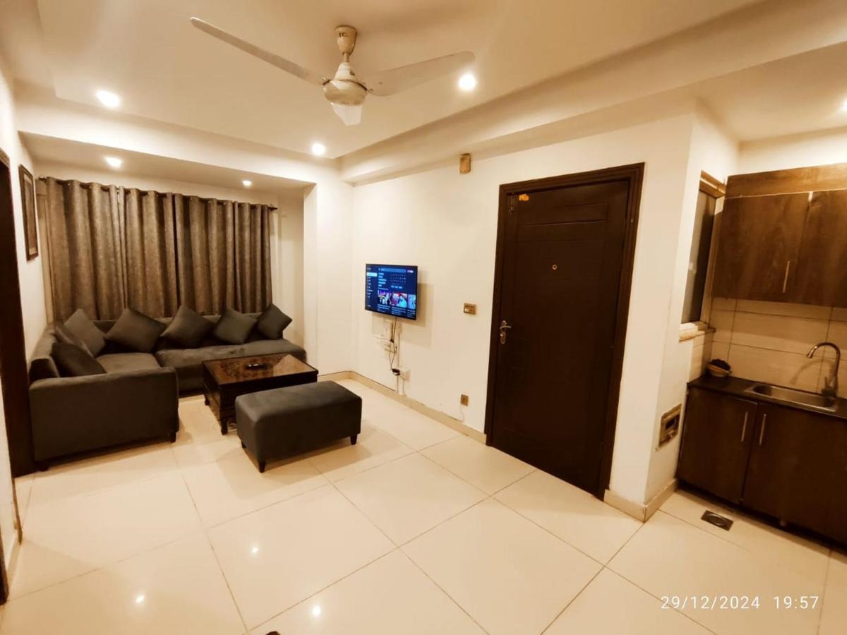 Comfort Hub Modern 2BR Apartments, prime location,Netflix WiFi - Hizvo