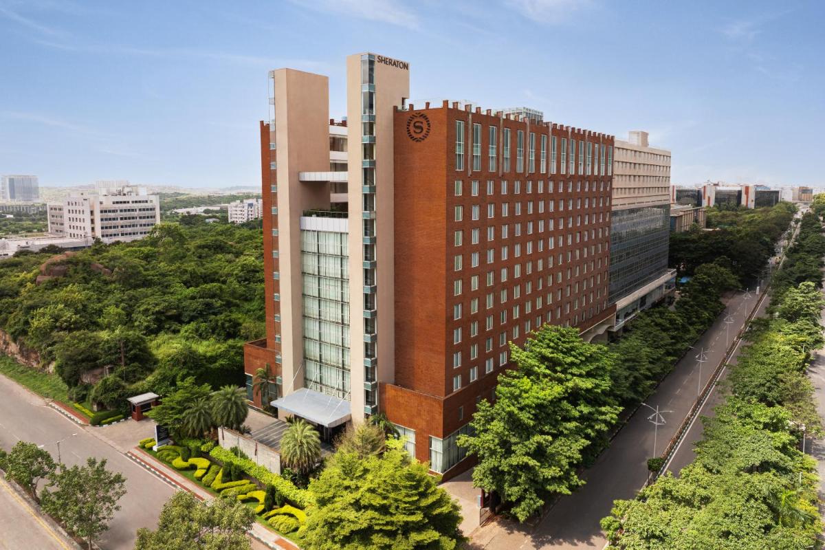 an overhead view of a tall building in a city at Sheraton Hyderabad Hotel in Hyderabad