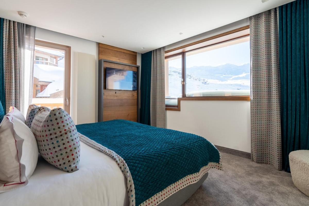 Un ou plusieurs lits dans un hébergement de l'établissement Hotel Pashmina Le Refuge