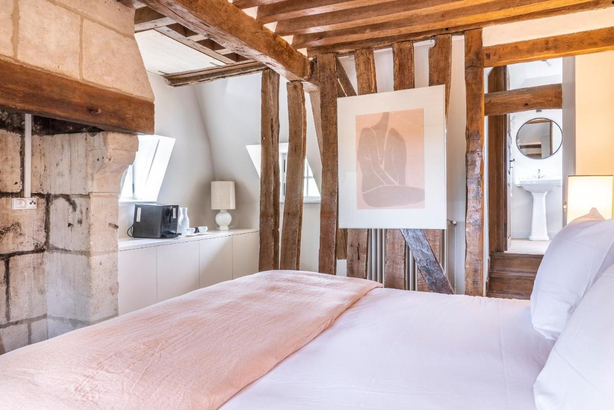 Un ou plusieurs lits dans un hébergement de l'établissement Les Manoirs des Portes de Deauville - Small Luxury Hotel Of The World
