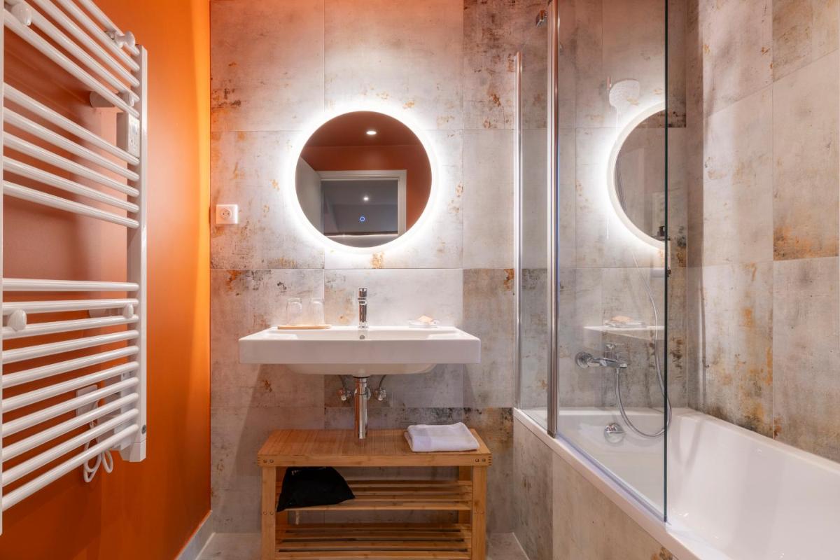 Salle de bains dans l'établissement Hotel Le Bois Joli