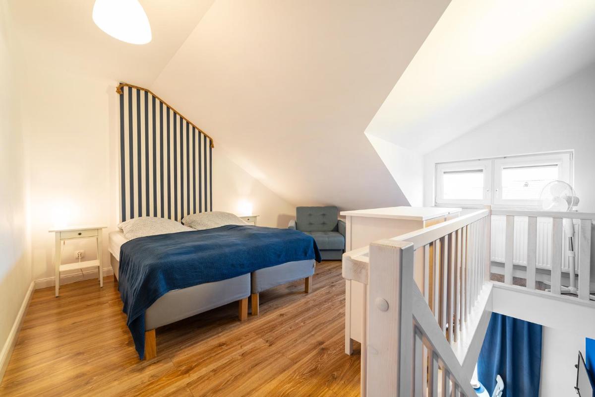 Apartamenty Białe Piaski - Housity