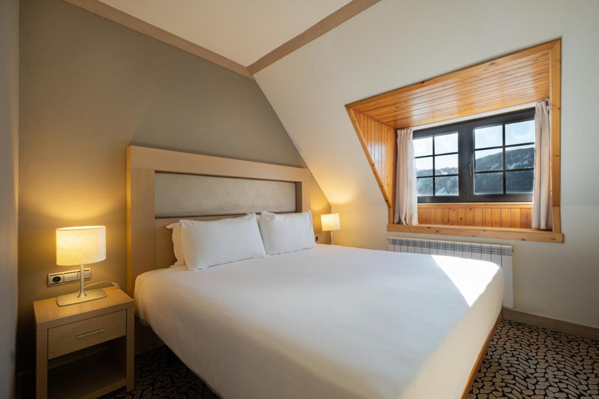 Cama o camas de una habitación en Eurostars Royal Tanau