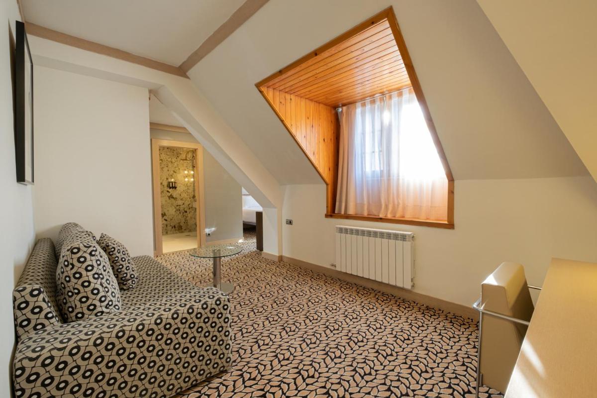 Cama o camas de una habitación en Eurostars Royal Tanau