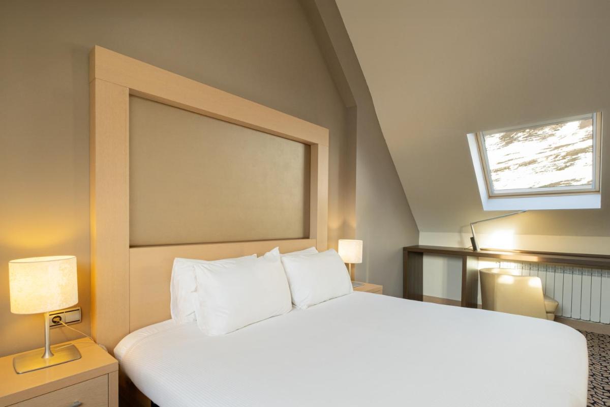 Cama o camas de una habitación en Eurostars Royal Tanau