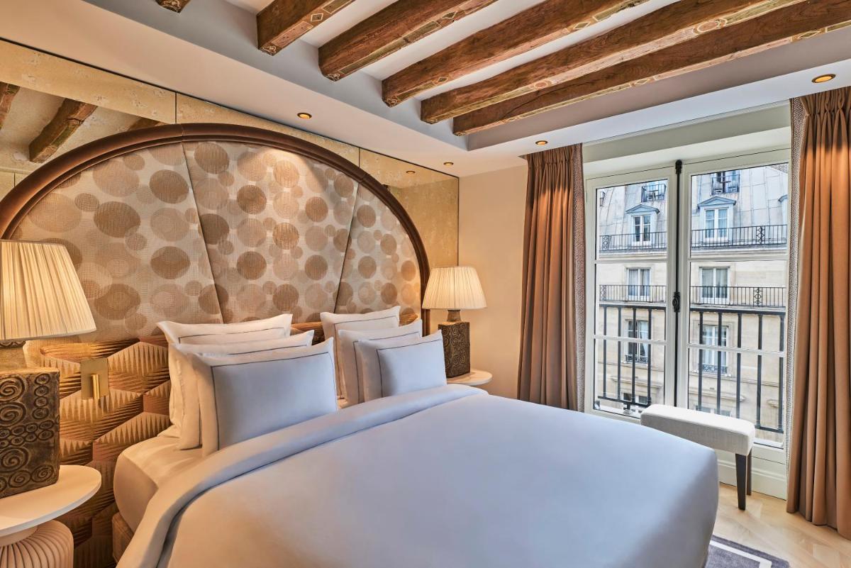 Un ou plusieurs lits dans un hébergement de l'établissement Maison Barrière Vendôme
