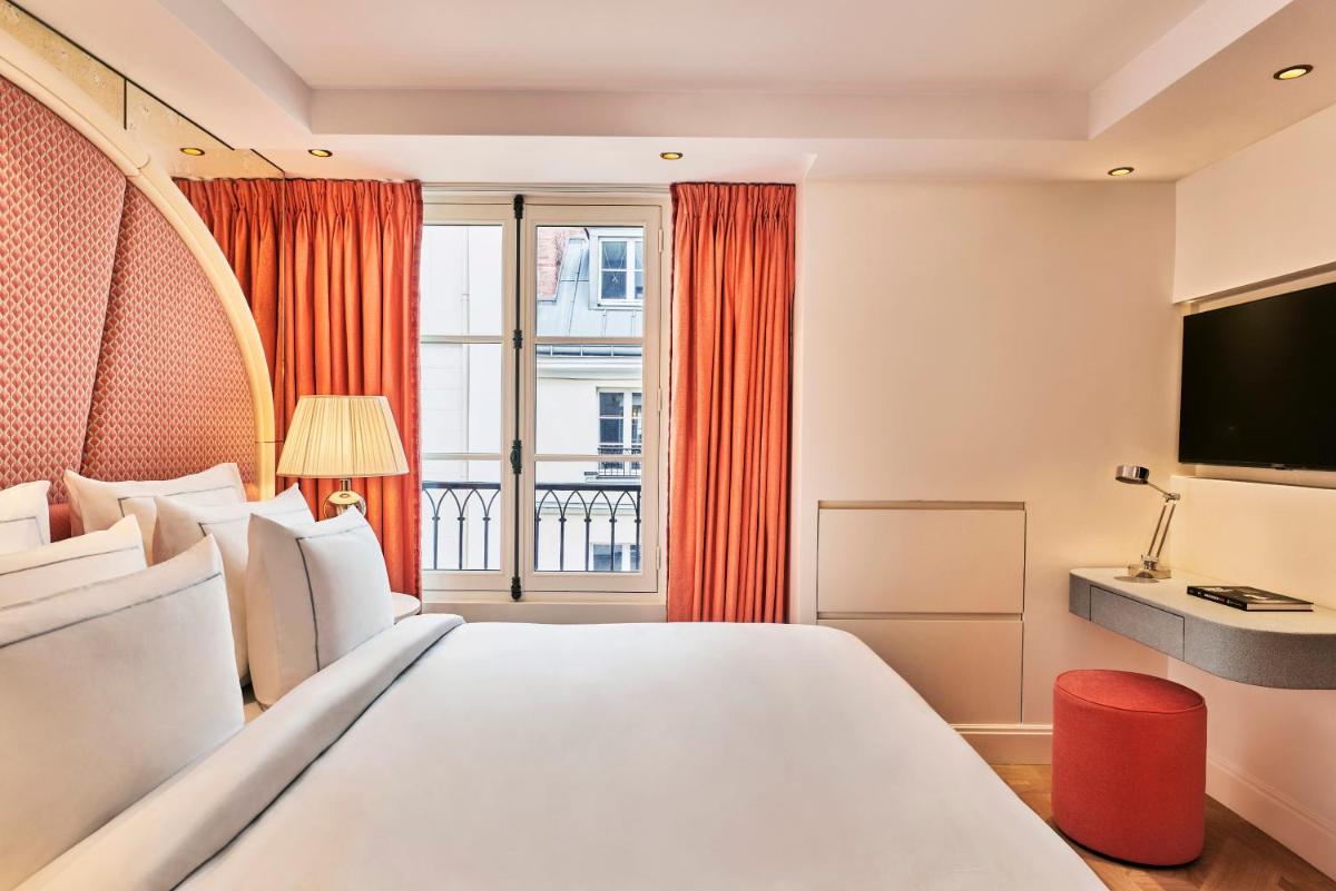 Un ou plusieurs lits dans un hébergement de l'établissement Maison Barrière Vendôme