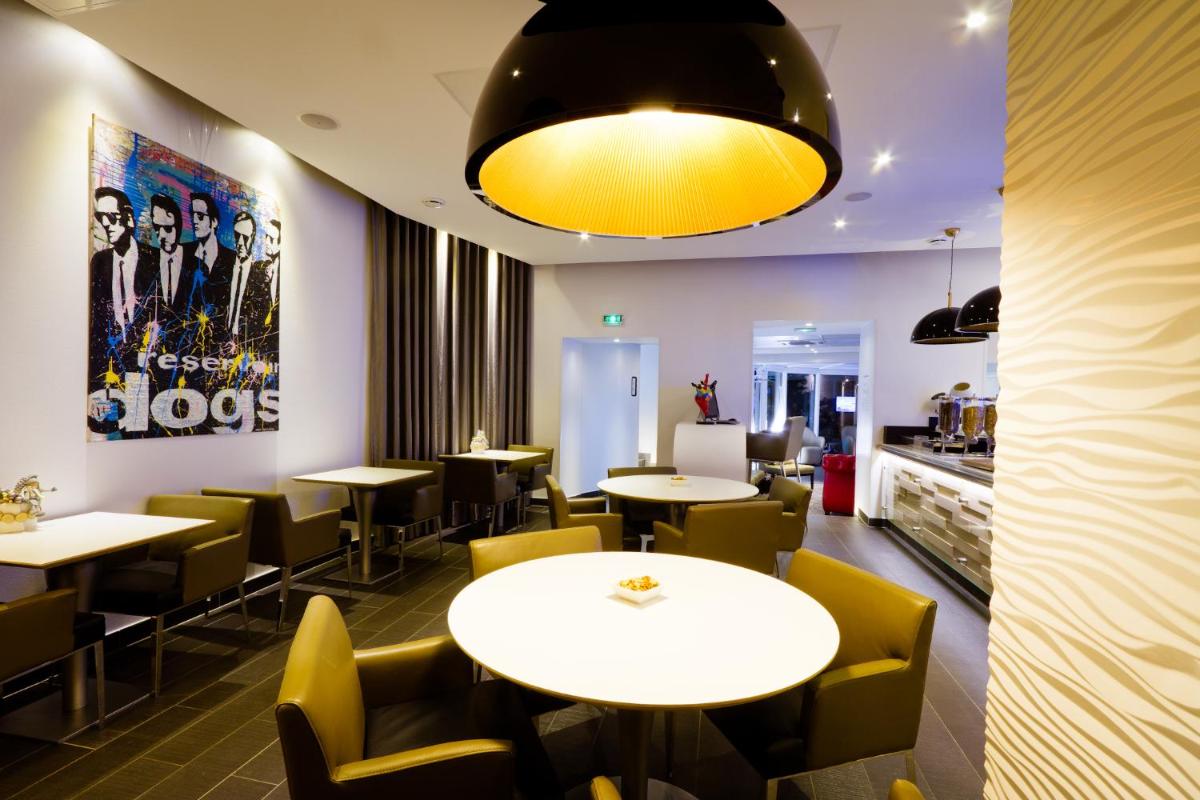 Coin salon dans l'établissement Hôtel et Spa La Villa K - Basel Airport