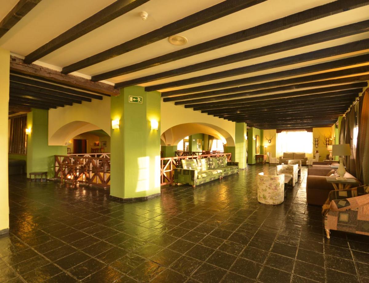 Zona de estar de Hotel GHM Monachil