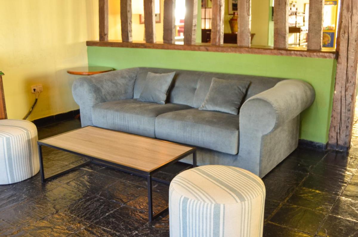 Zona de estar de Hotel GHM Monachil