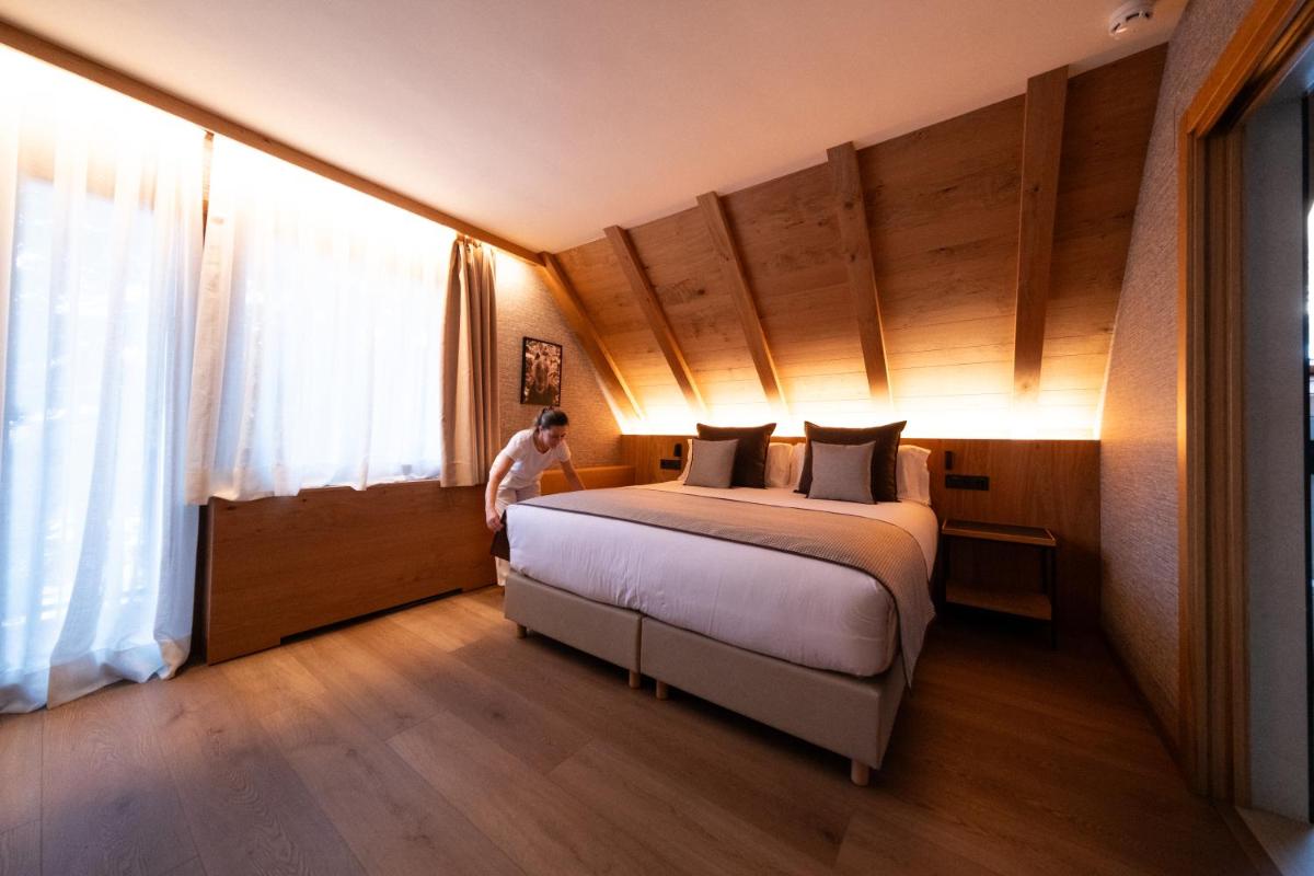 Cama o camas de una habitación en Hotel Petit Lacreu