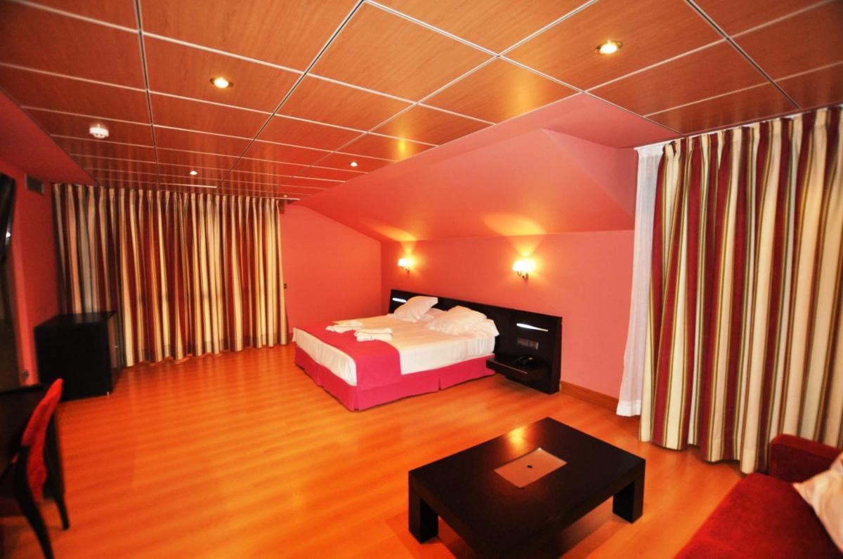Cama o camas de una habitación en Gran Hotel Liber & Spa Playa Golf