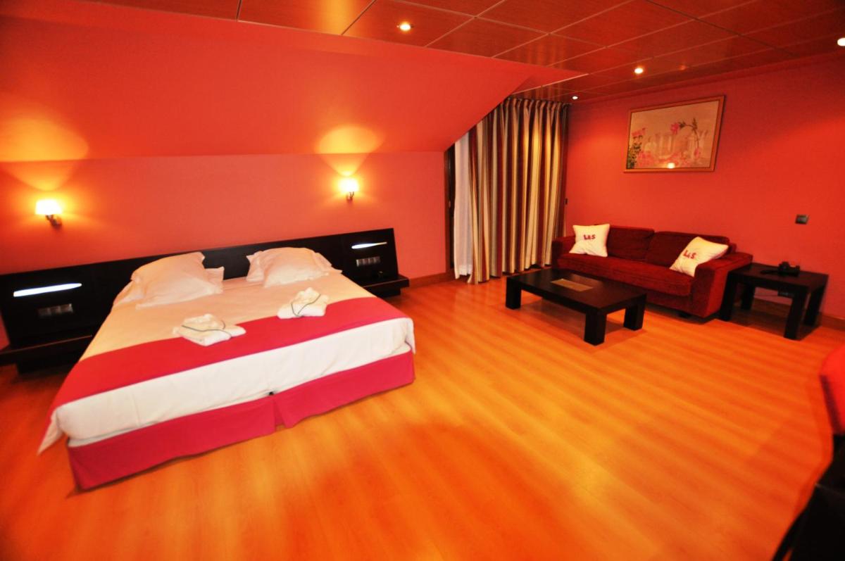 Cama o camas de una habitación en Gran Hotel Liber & Spa Playa Golf