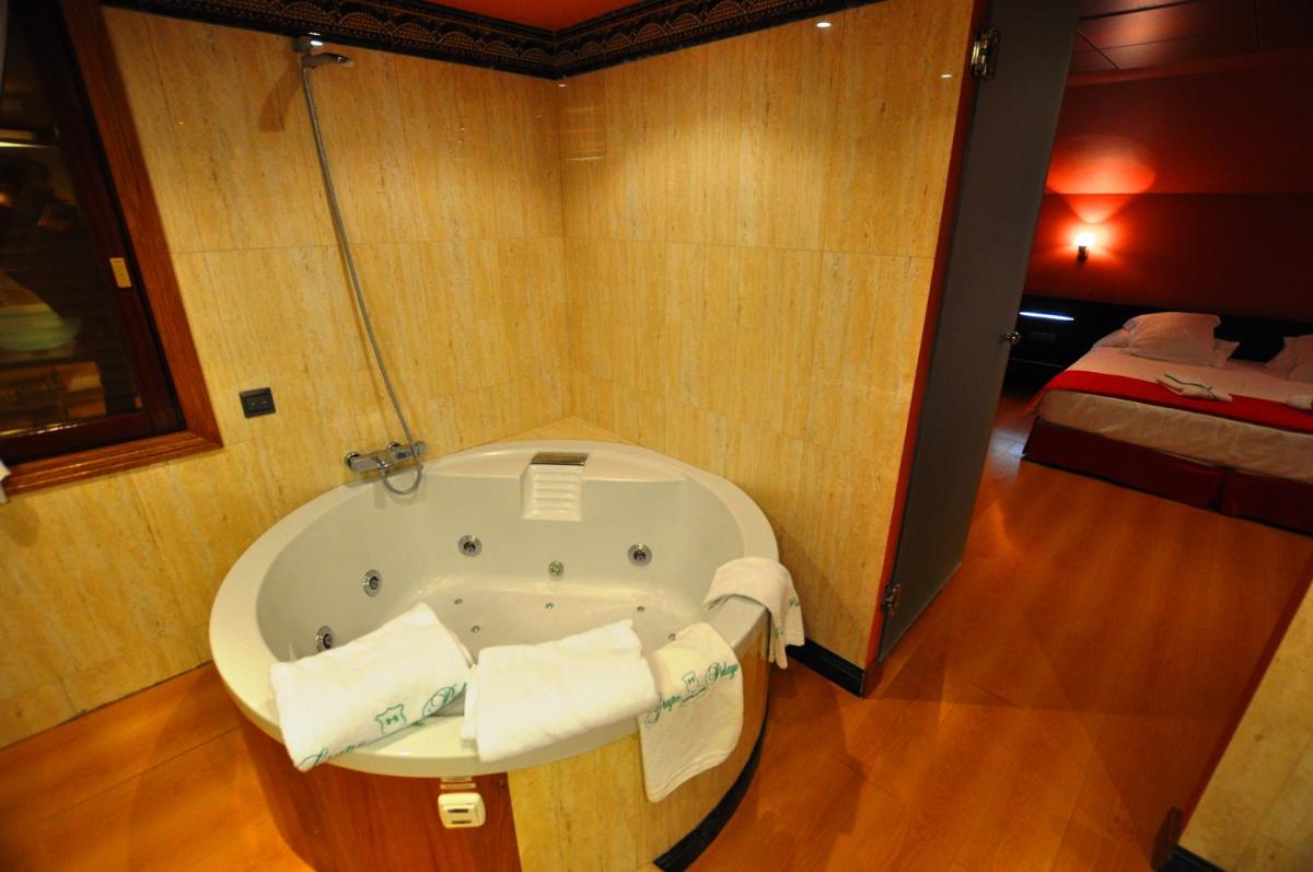 Cama o camas de una habitación en Gran Hotel Liber & Spa Playa Golf