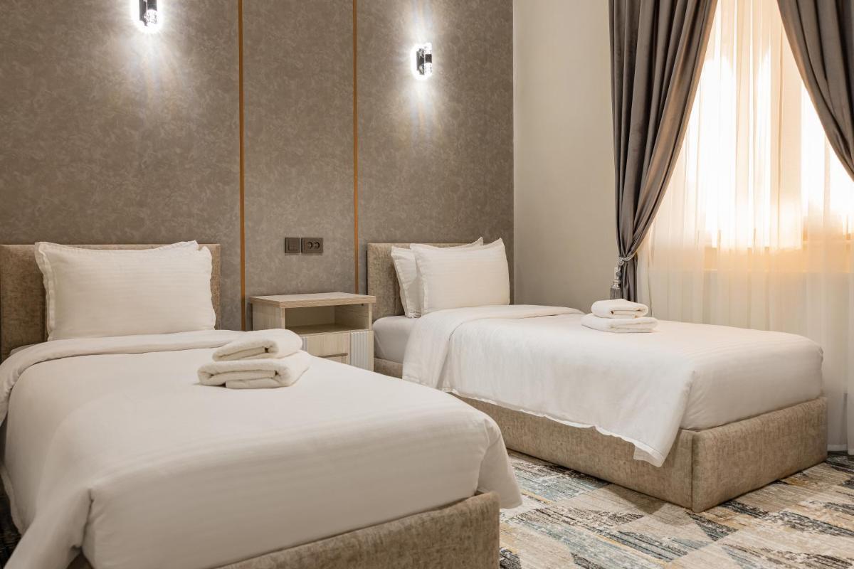 Hotel Shodlik - Housity