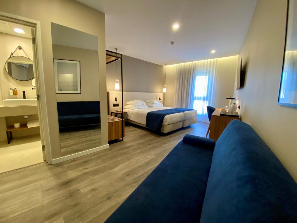 Uma cama ou camas num quarto em AP Sines - Costa Alentejana