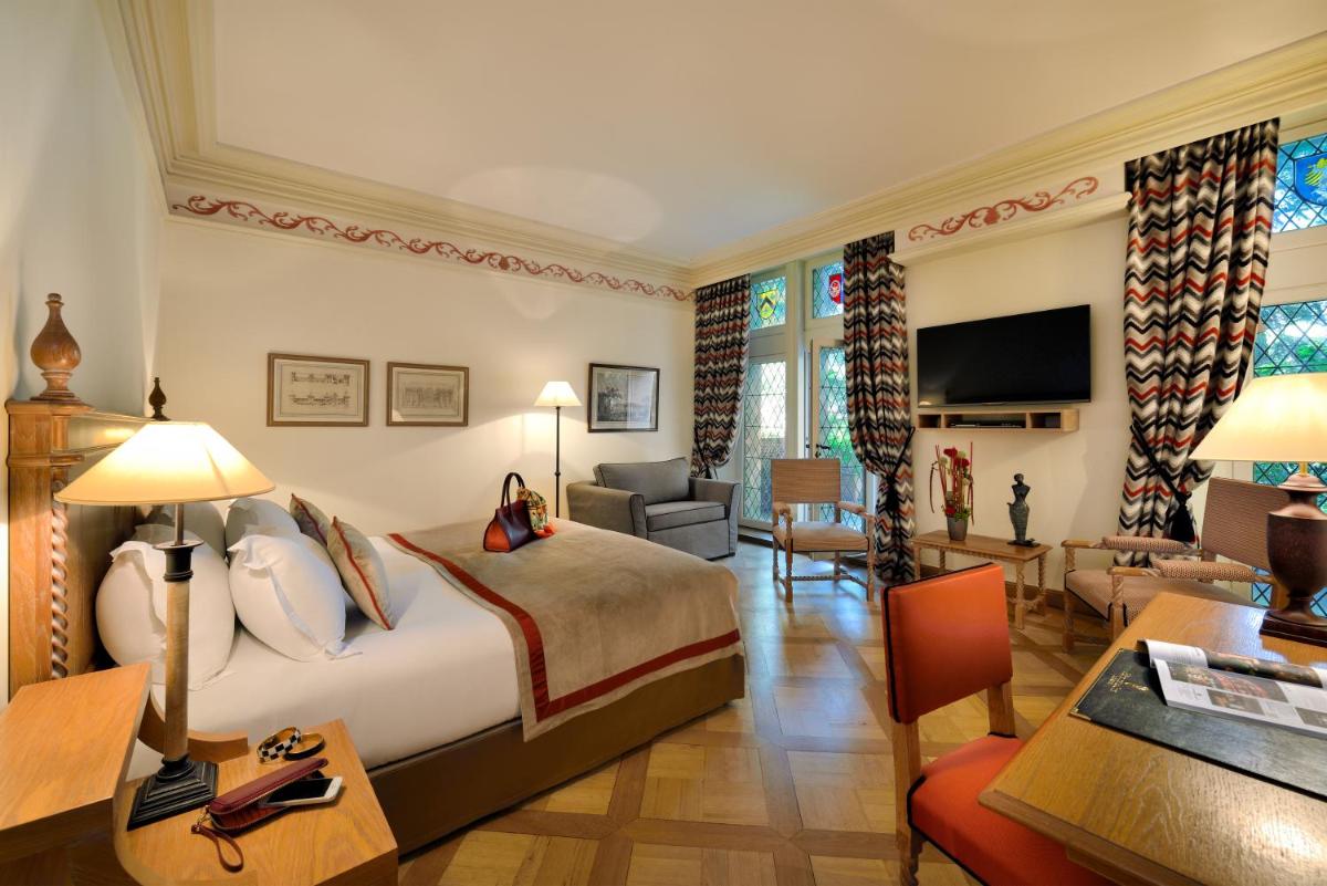 Télévision ou salle de divertissement dans l'établissement Hotel de la Cité Carcassonne - MGallery Collection