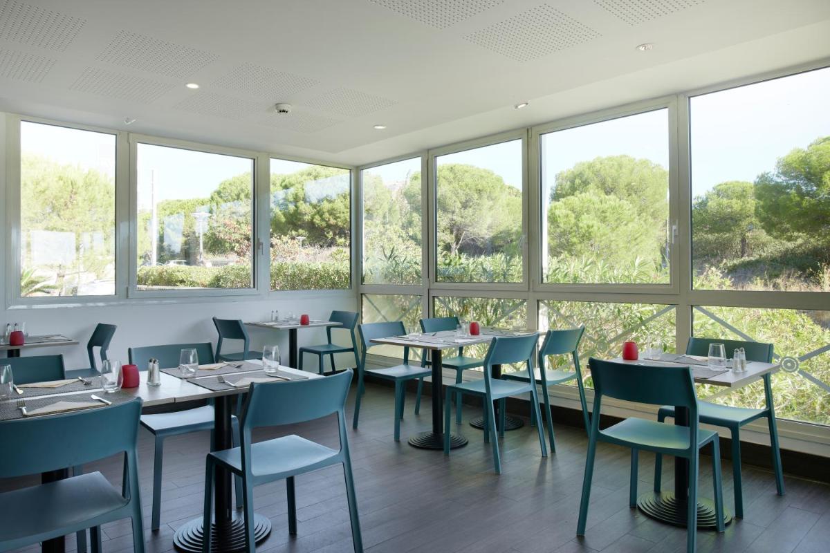 Hôtel restaurant Kyriad Fréjus - Hizvo