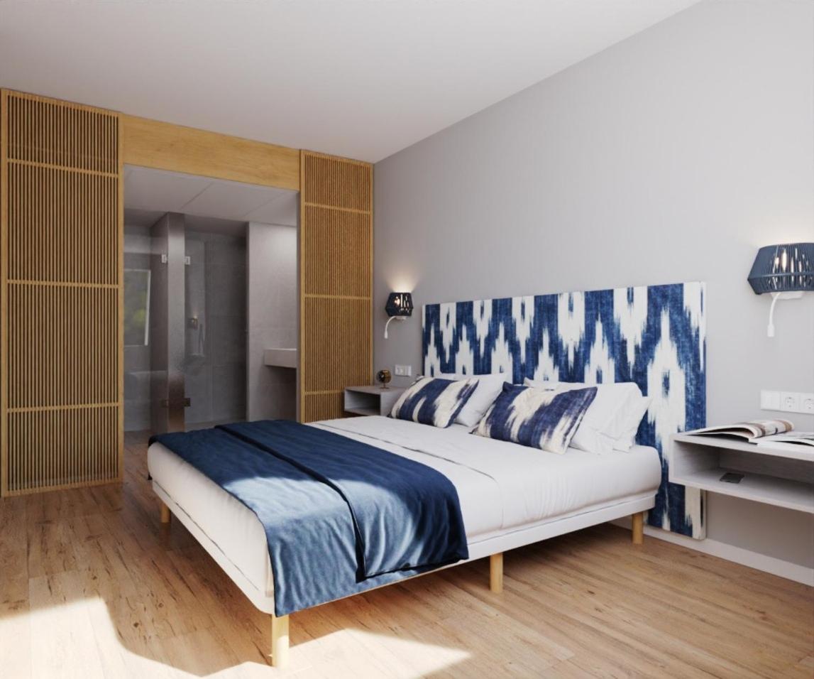 Cama o camas de una habitación en Blau Punta Reina