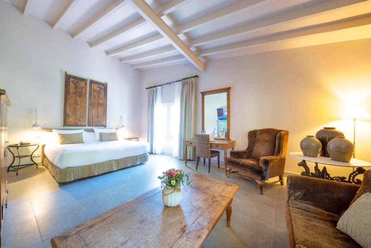 Cama o camas de una habitación en Hotel Huerto del Cura