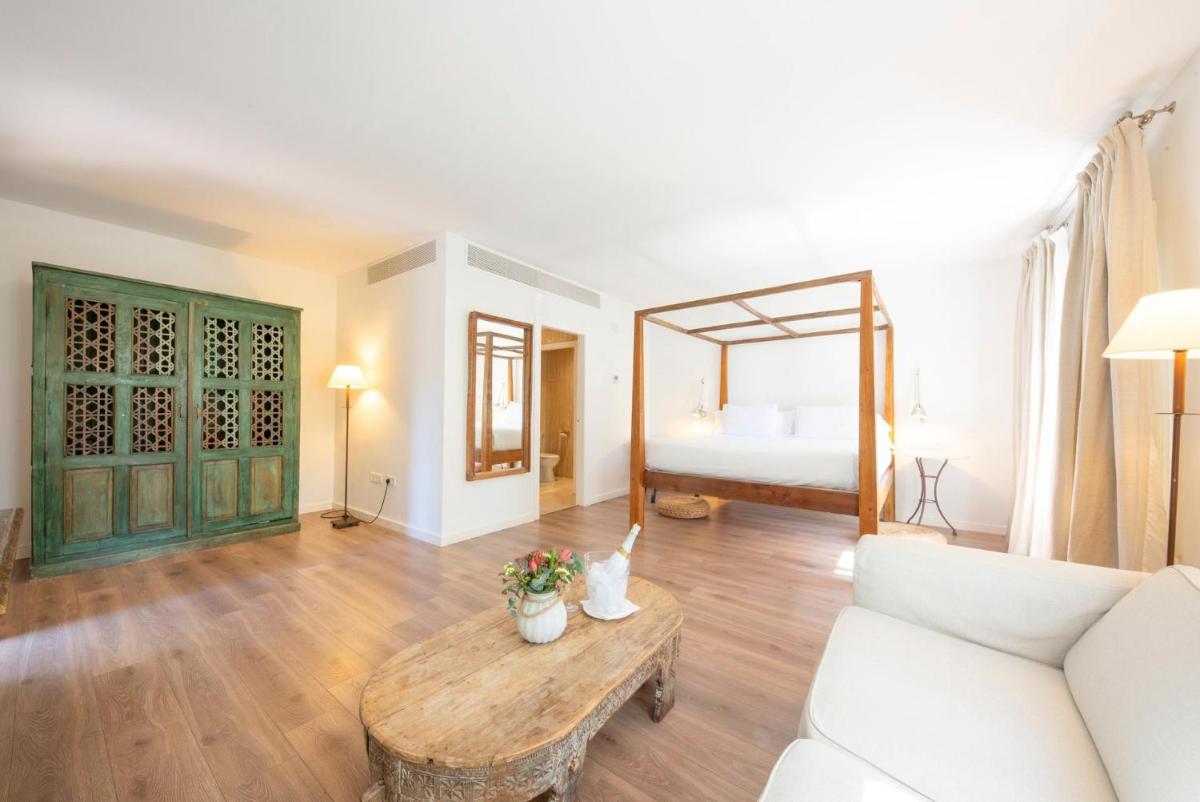 Cama o camas de una habitación en Hotel Huerto del Cura