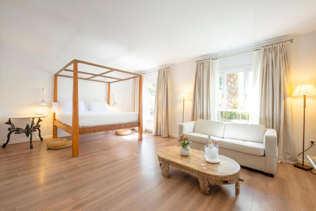 Cama o camas de una habitación en Hotel Huerto del Cura