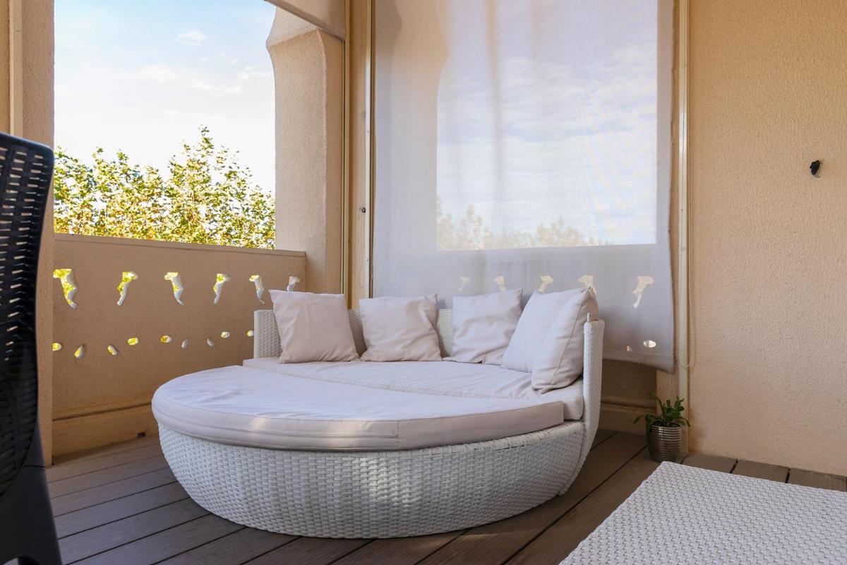Cama o camas de una habitación en 1881 Hotel Balneario Vichy Catalan