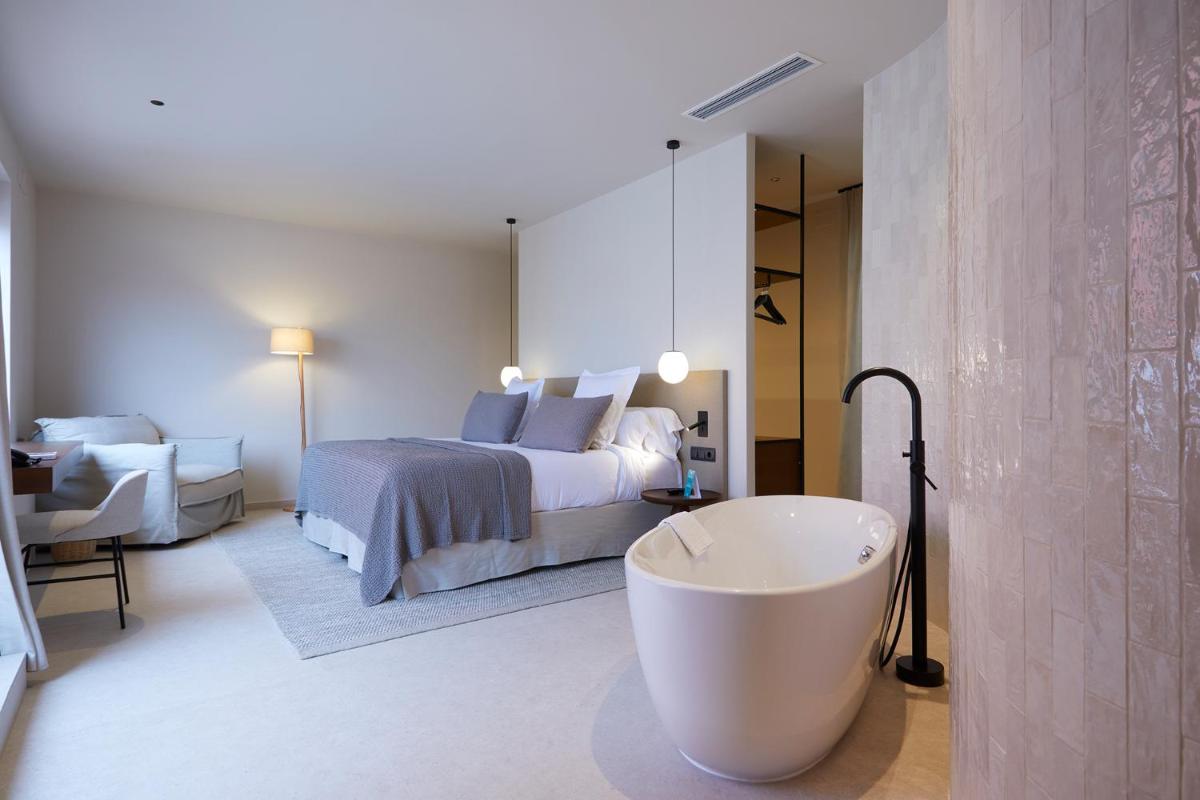 Cama o camas de una habitación en 1881 Hotel Balneario Vichy Catalan