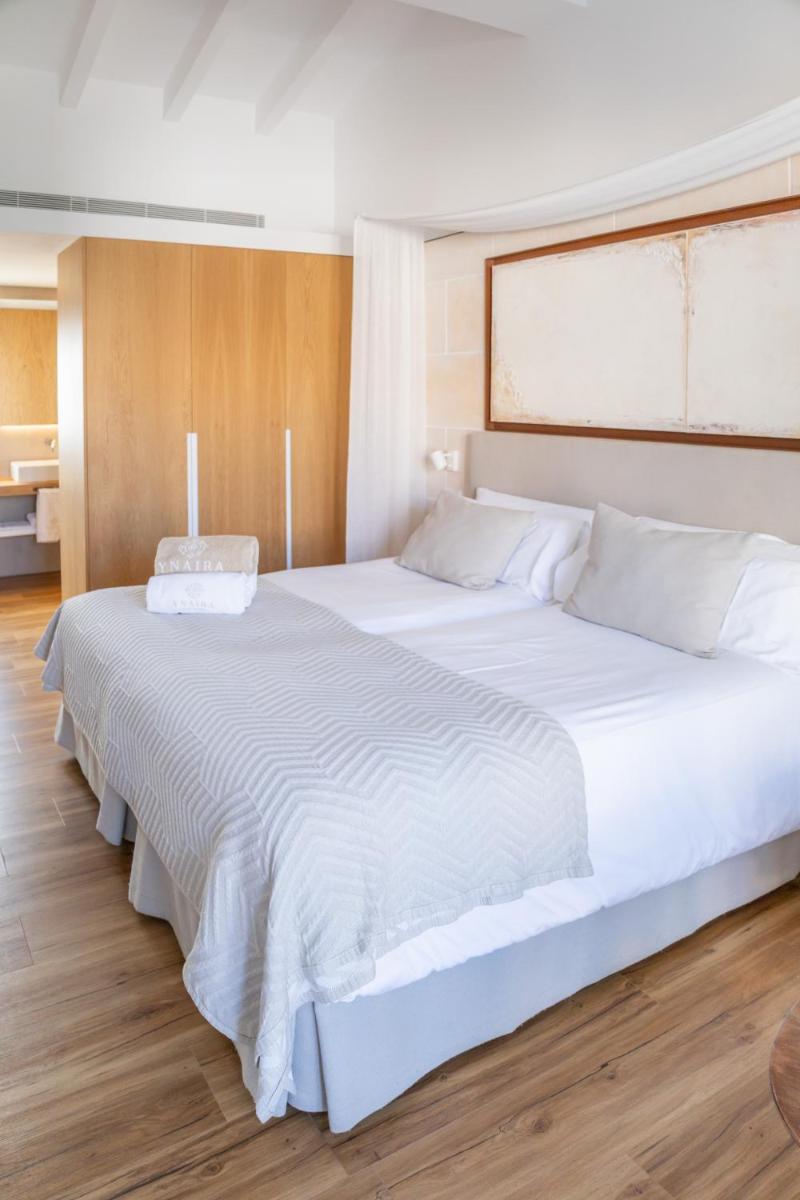 Cama o camas de una habitación en Ynaira hotel & Spa