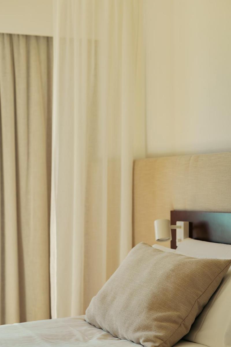 Cama o camas de una habitación en Ynaira hotel & Spa