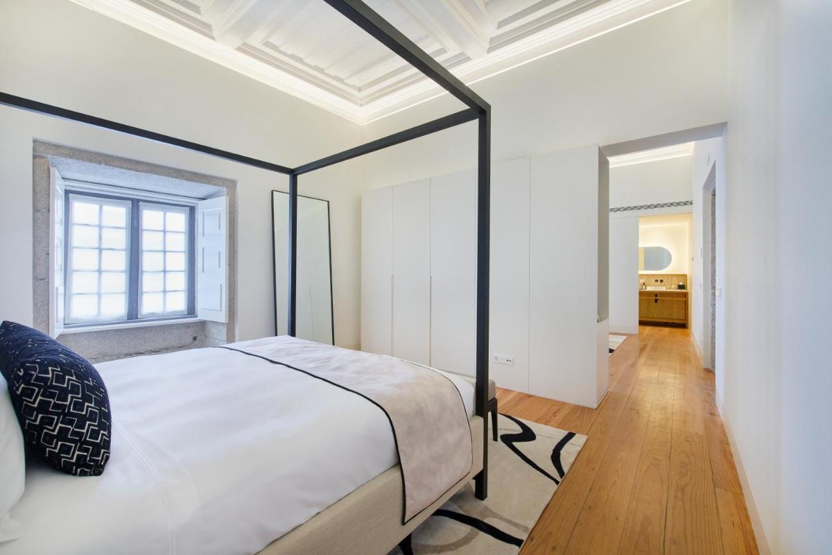 Uma cama ou camas num quarto em MS Collection Arouca - Mosteiro de Arouca