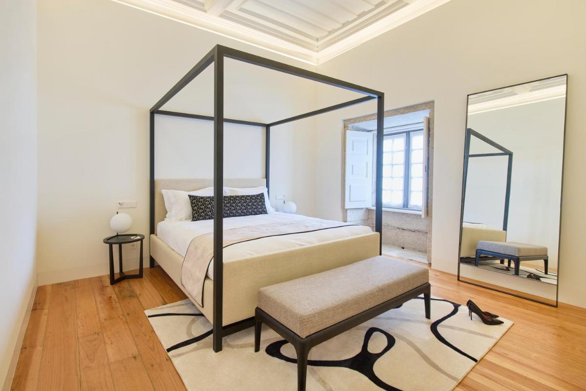 Uma cama ou camas num quarto em MS Collection Arouca - Mosteiro de Arouca