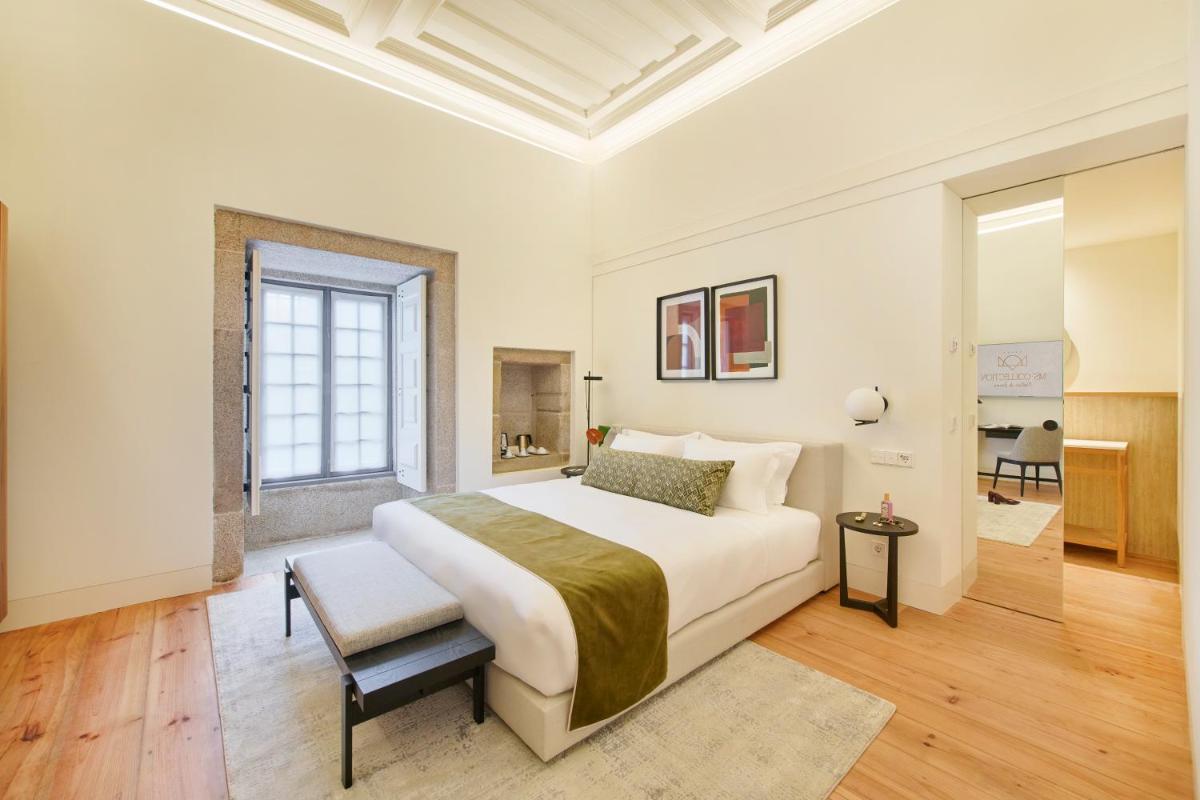 Uma cama ou camas num quarto em MS Collection Arouca - Mosteiro de Arouca