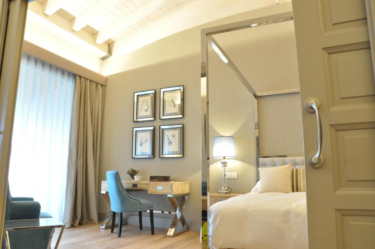 Cama o camas de una habitación en Puebloastur Eco Resort Hotel & Spa
