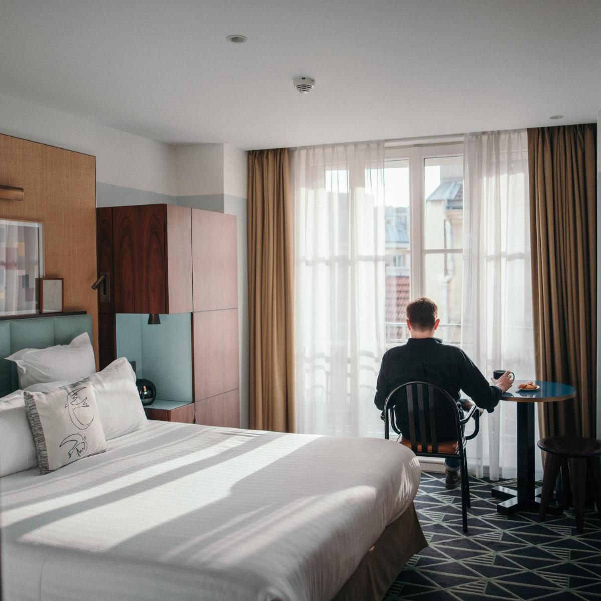 Un ou plusieurs lits dans un hébergement de l'établissement Hotel Eiffel Blomet