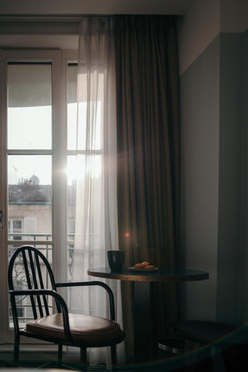 Coin salon dans l'établissement Hotel Eiffel Blomet