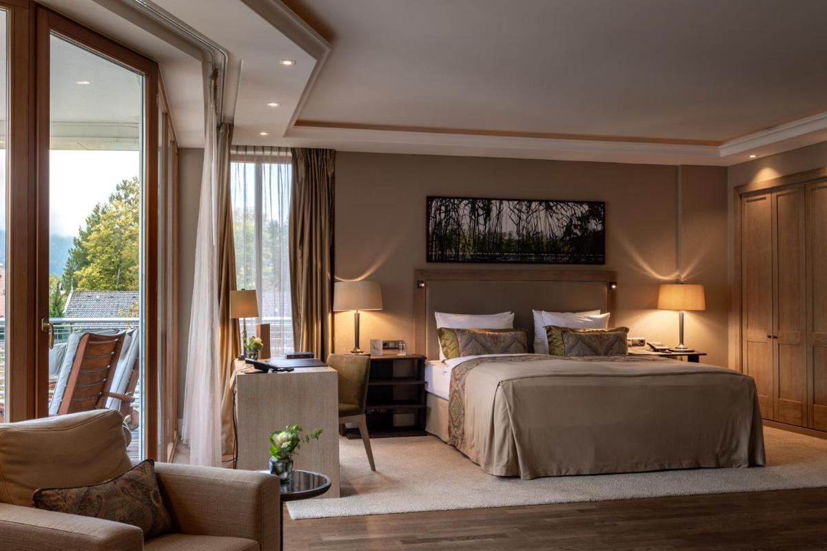 Ein Bett oder Betten in einem Zimmer der Unterkunft Althoff Seehotel Überfahrt