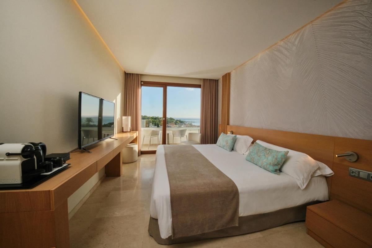 Cama o camas de una habitación en Hotel Son Caliu Spa Oasis
