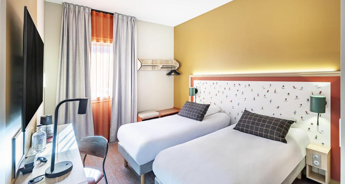 Télévision ou salle de divertissement dans l'établissement Best Western Coeur de Maurienne Hotel Restaurant & Spa