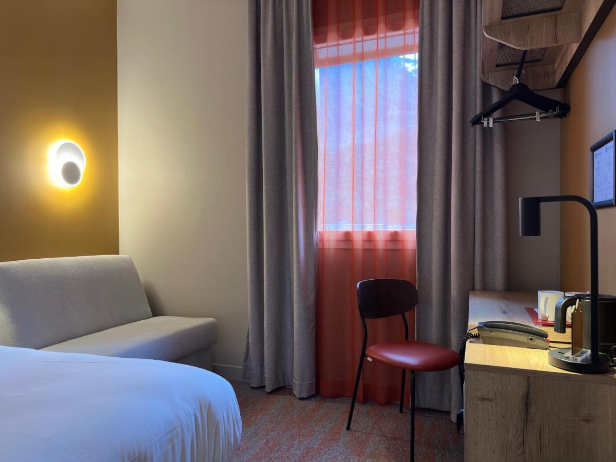 Un ou plusieurs lits dans un hébergement de l'établissement Best Western Coeur de Maurienne Hotel Restaurant & Spa