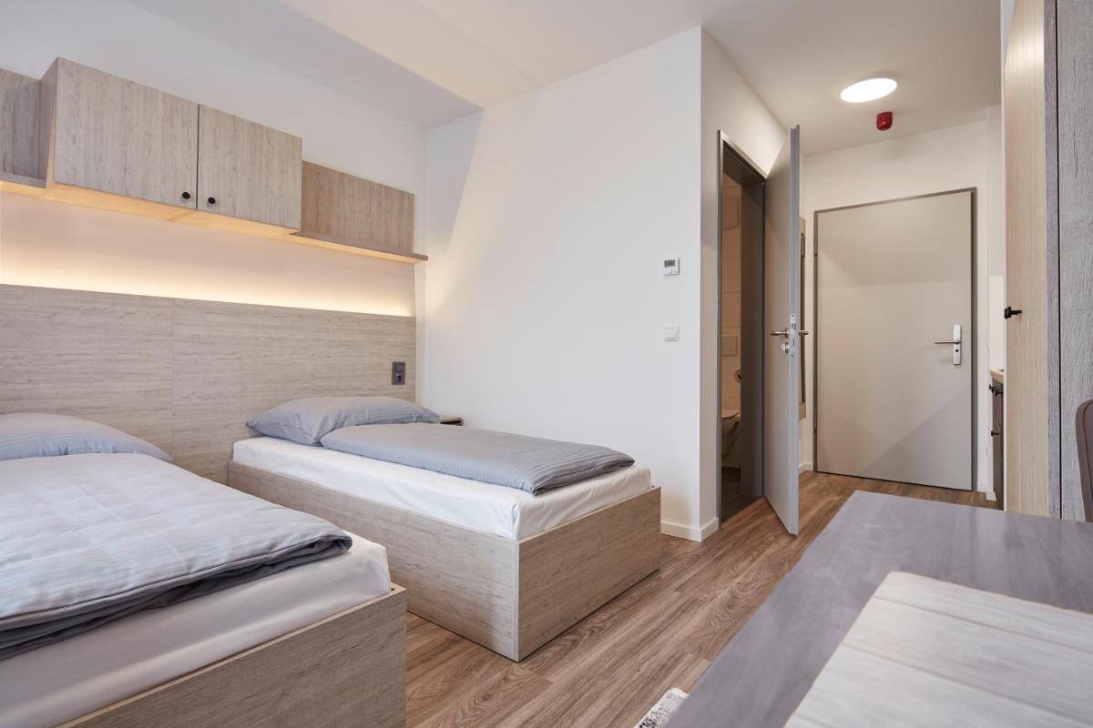 Bader Aparthotel - Housity