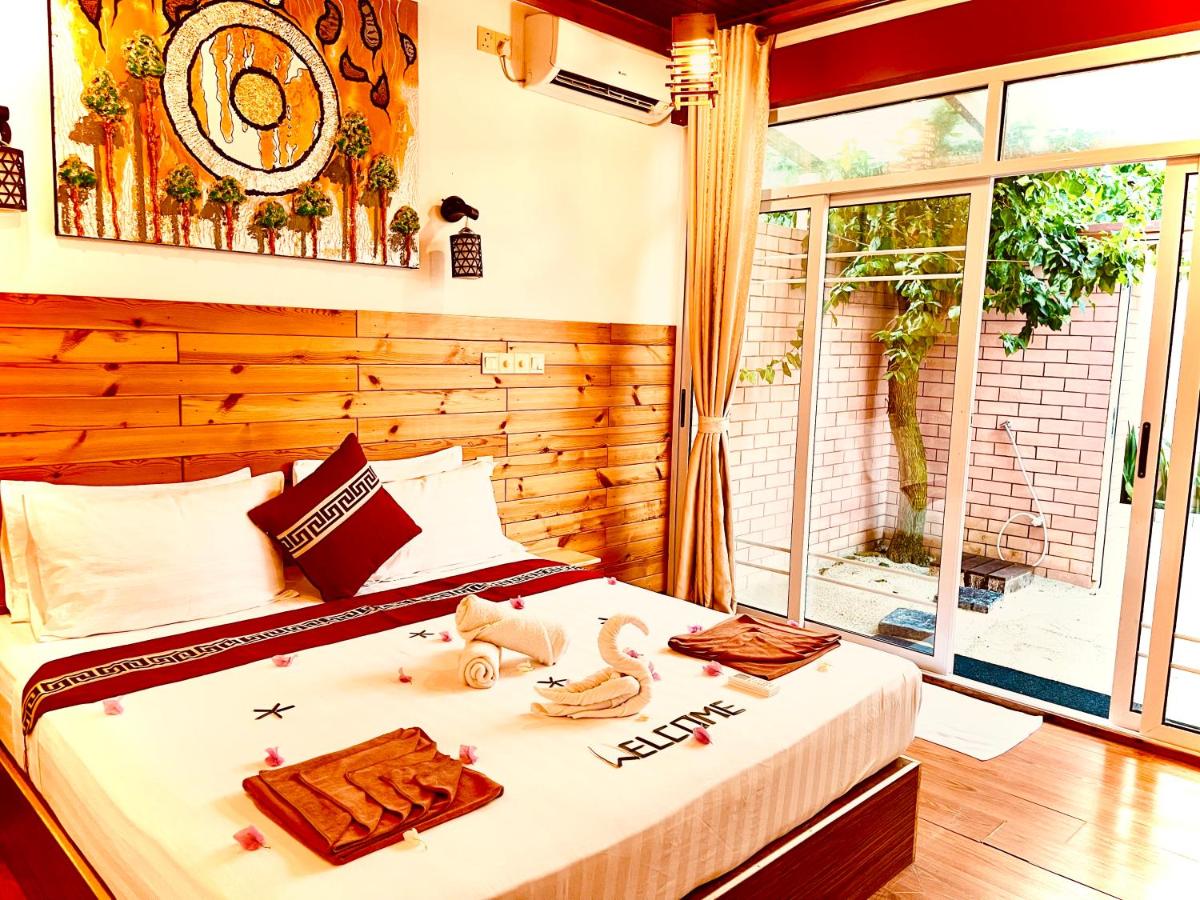 New Breeze Thoddoo Inn - Housity