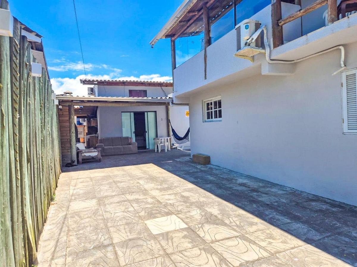 Residencial da Bia - Casas com 2 Dorms, Ar e Piscina Térmica e Coberta na Praia da Cal - Housity