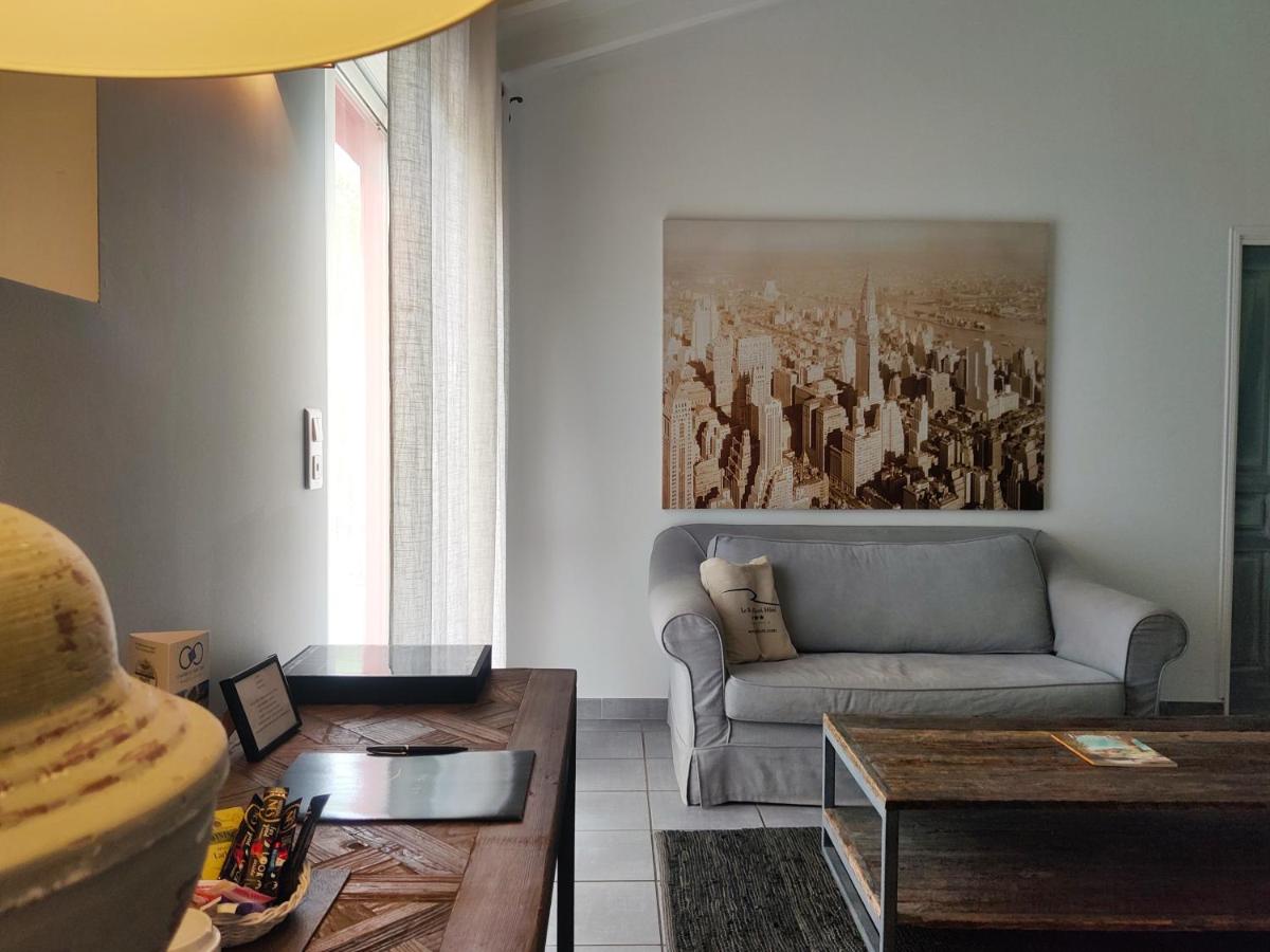 Coin salon dans l'établissement Le Roc E Fiori Hotel - Teritoria