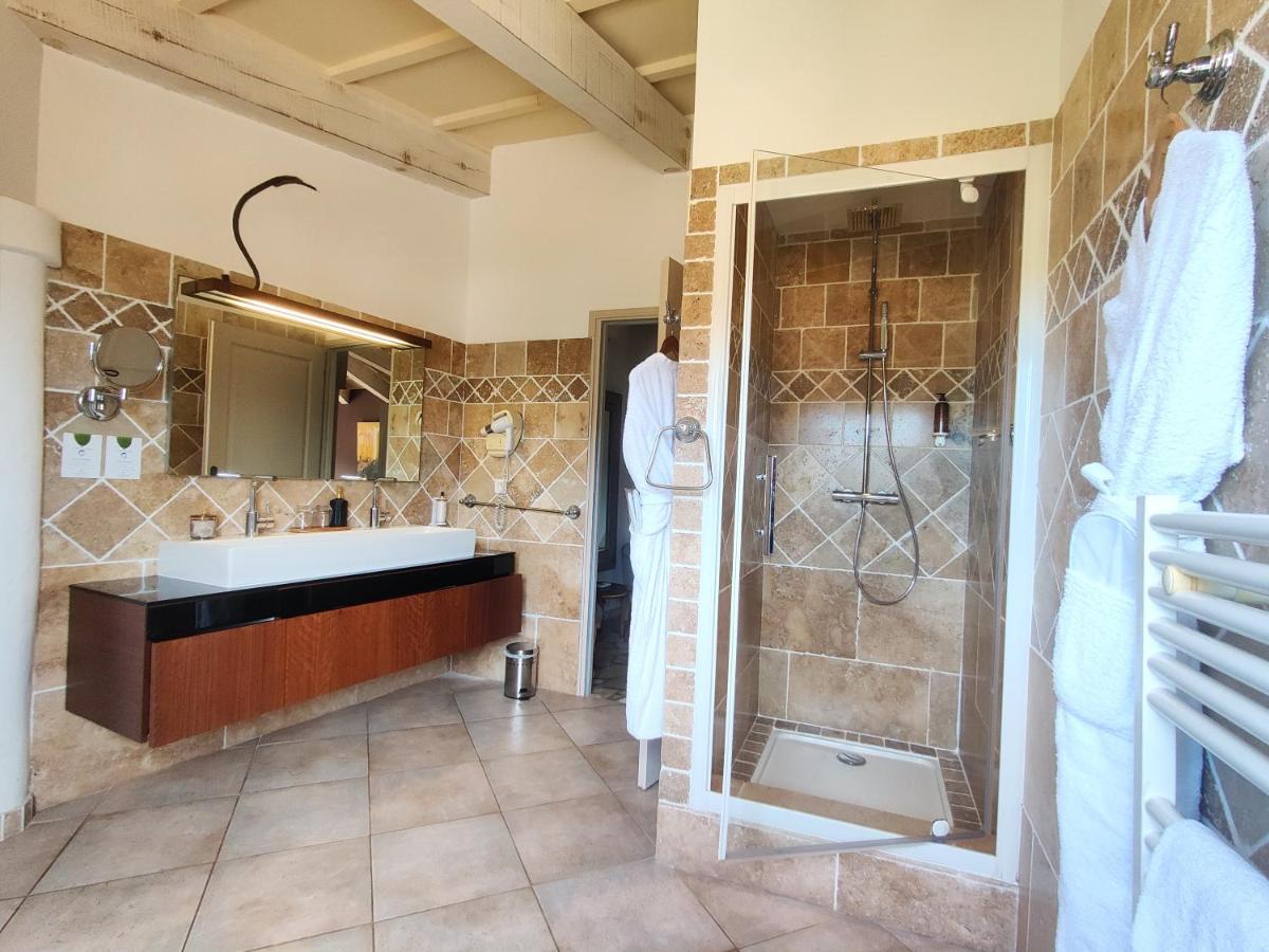 Salle de bains dans l'établissement Le Roc E Fiori Hotel - Teritoria