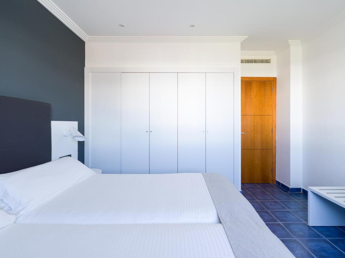 Cama o camas de una habitación en Hotel Mirador Papagayo by LIVVO