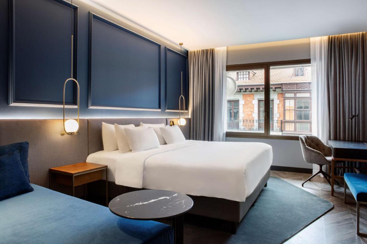 Cama o camas de una habitación en Radisson Collection Bilbao
