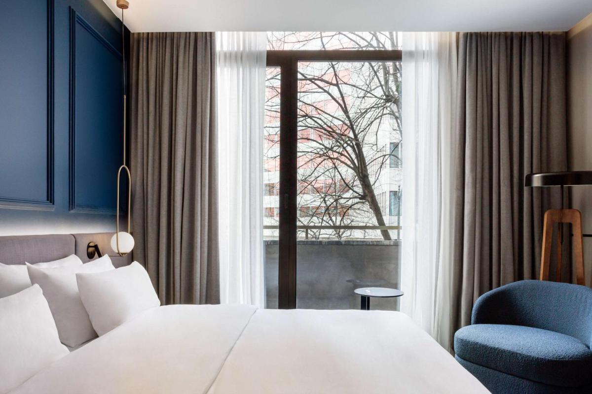 Cama o camas de una habitación en Radisson Collection Bilbao
